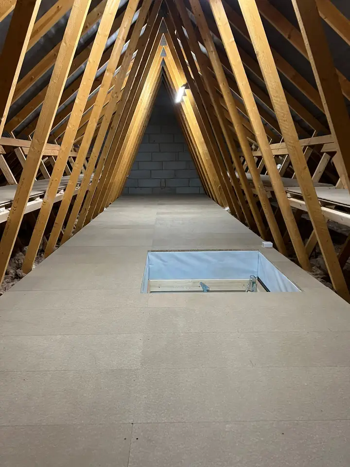 Loft boarding neatly finished around the hatch opening